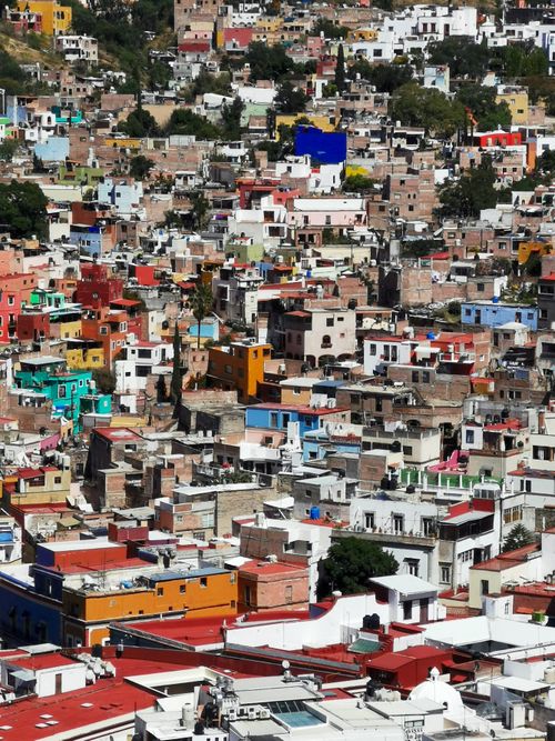 Free Aerial view of the colorful urban landscape in Guanajuato, highlighting vibrant architecture and cultural vibrancy. Stock Photo