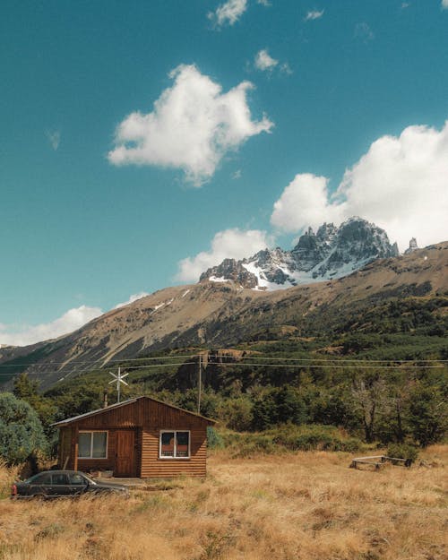 Wooden Hut by the Mountain 