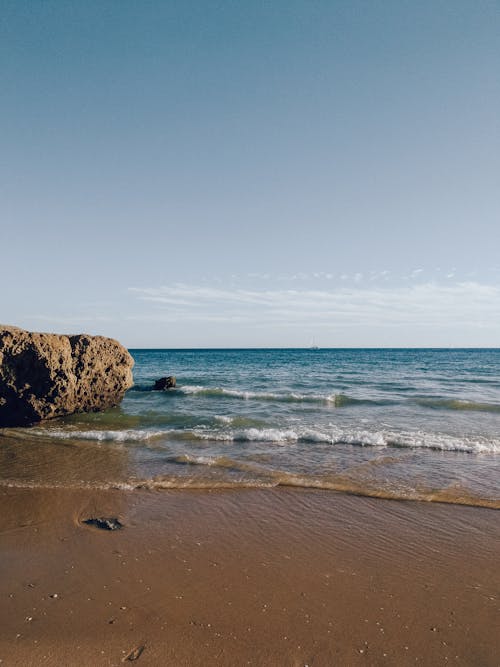 Ilmainen kuvapankkikuva tunnisteilla hiekkaranta, horisontti, meri