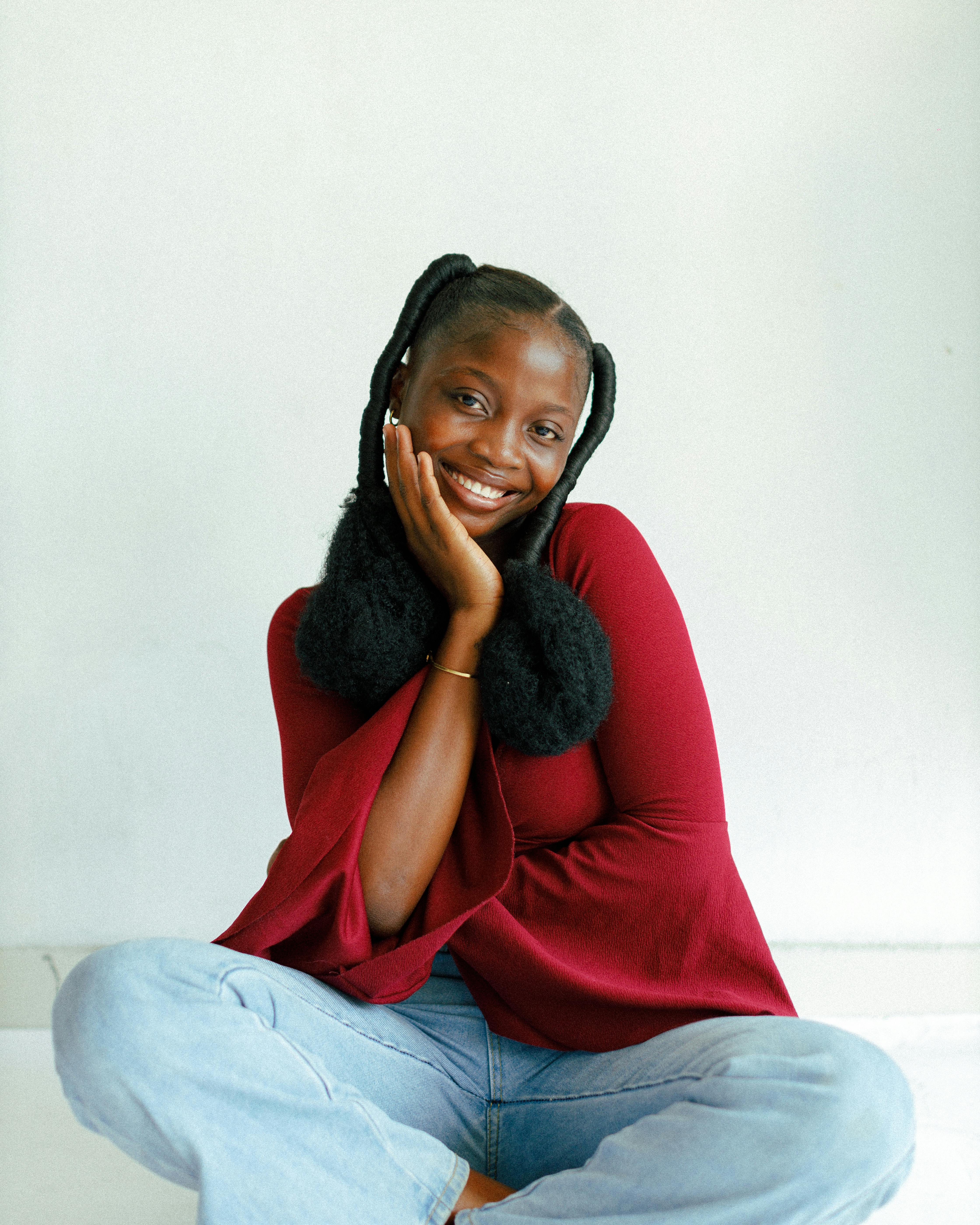 portrait of a girl sitting on the floor