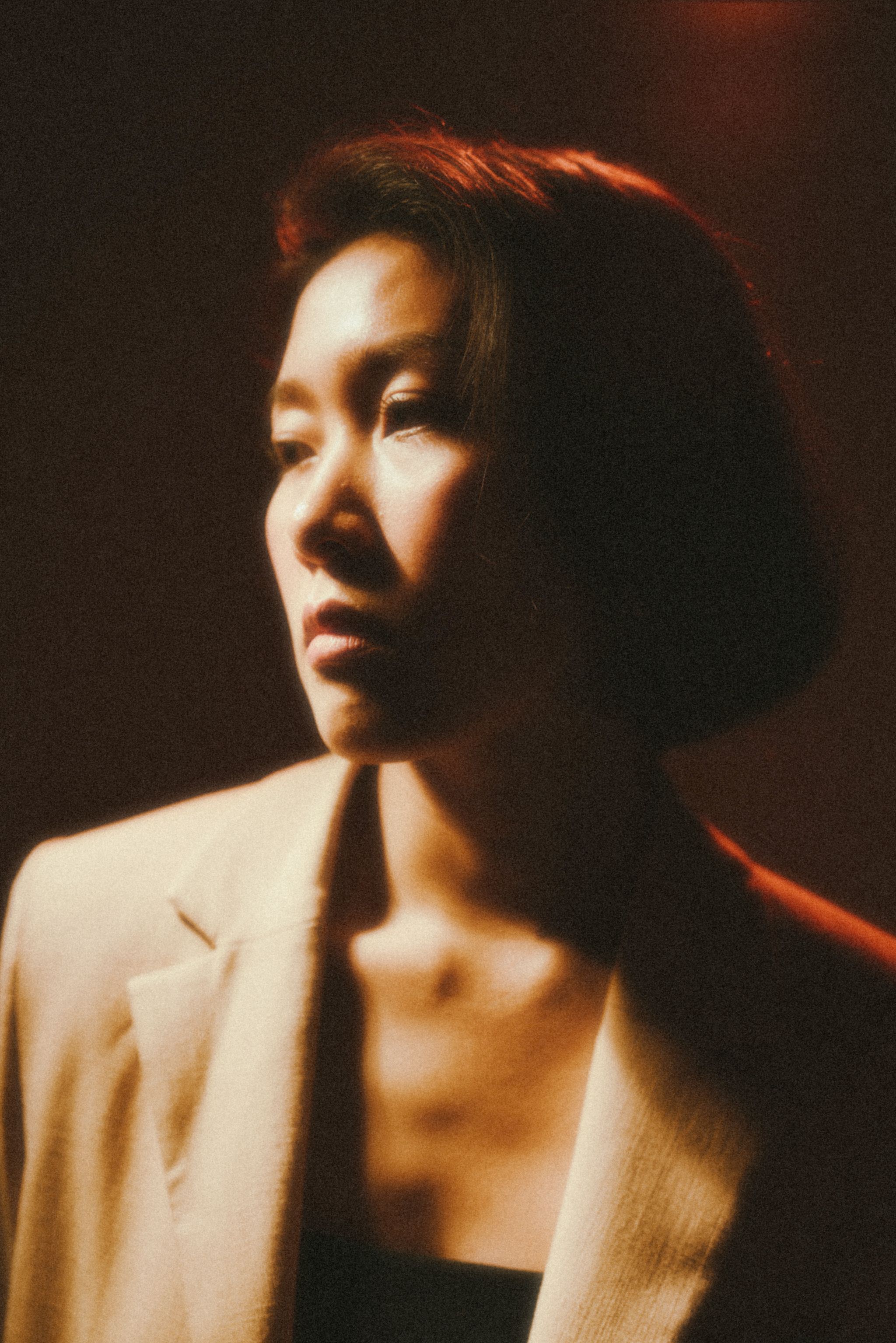 Brunette Woman Posing in Shadow · Free Stock Photo