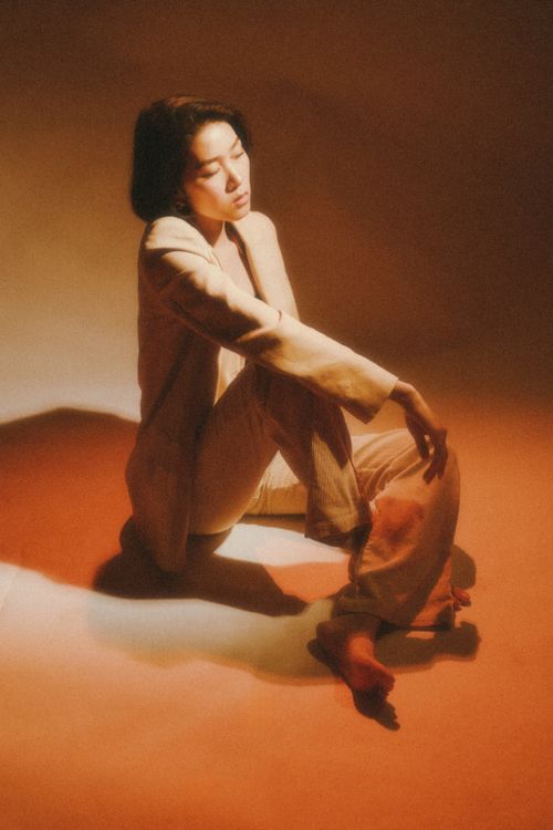 Free Fashion-studio shot of an elegant Asian woman posing gracefully. Stock Photo
