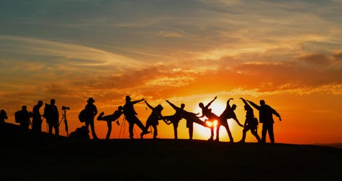 Free Silhouette of People during Golden Hour Stock Photo