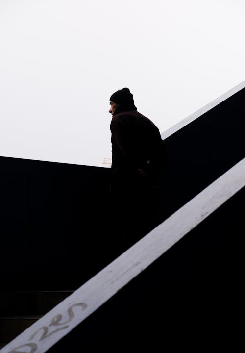 A man is standing on the stairs