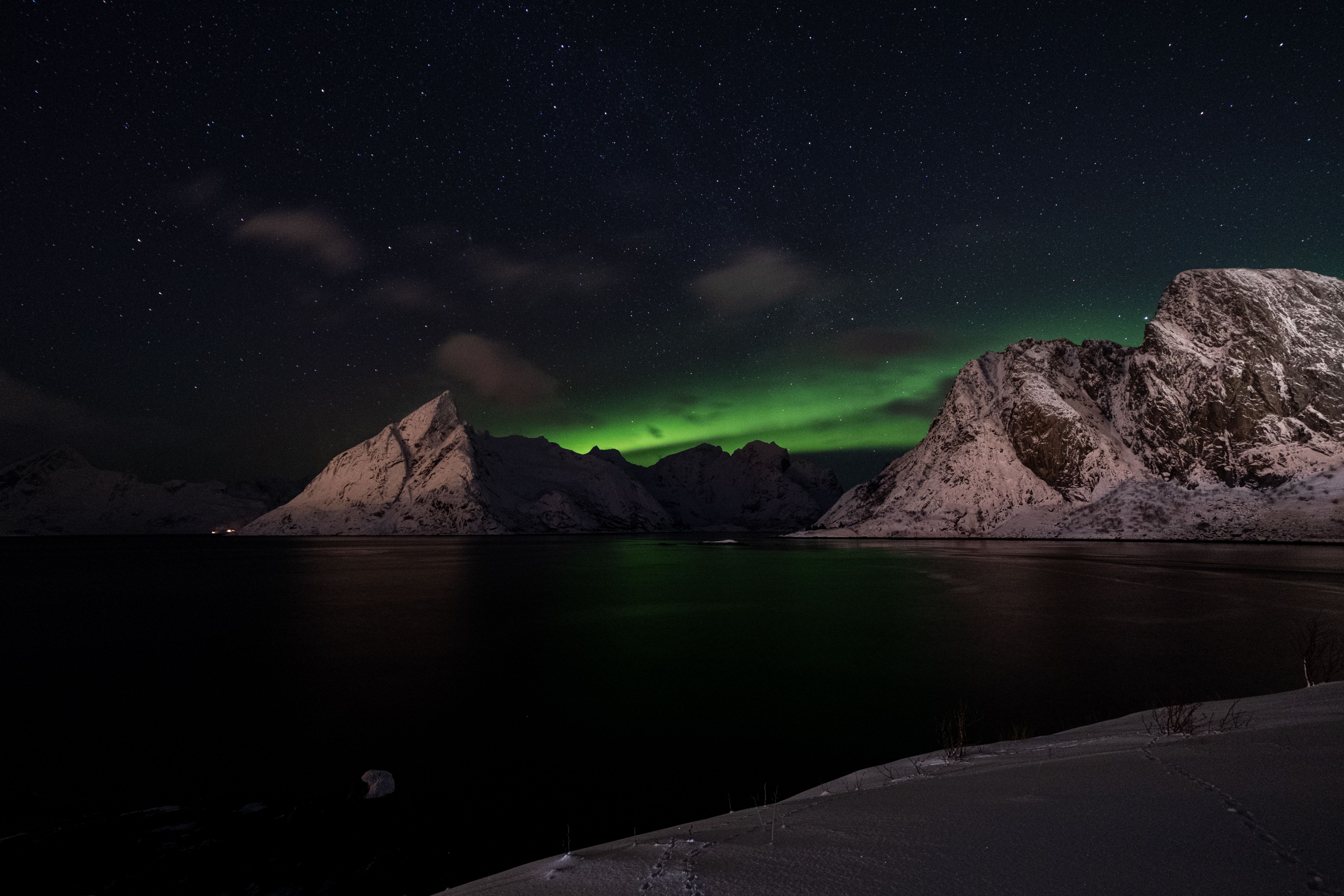 Northern lights illuminating Arctic sky