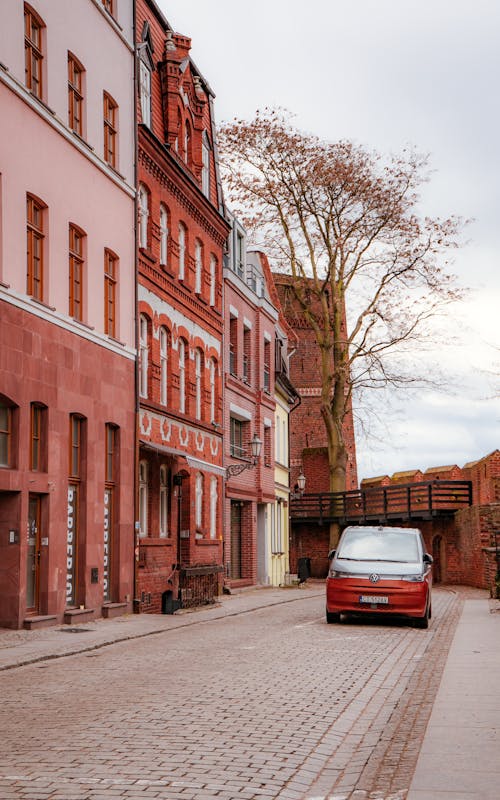 Gratis stockfoto met aan lichtbak toevoegen, auto, gebouwen