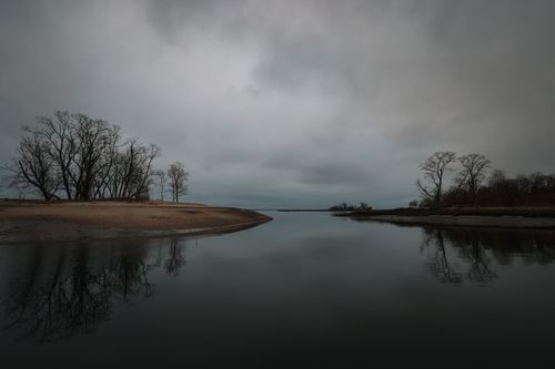 Free Stunning view of Cove Island Park's tranquil waters and bare trees, Stamford, USA. Stock Photo