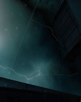Powerful lightning bolt illuminates the sky during a nighttime thunderstorm.