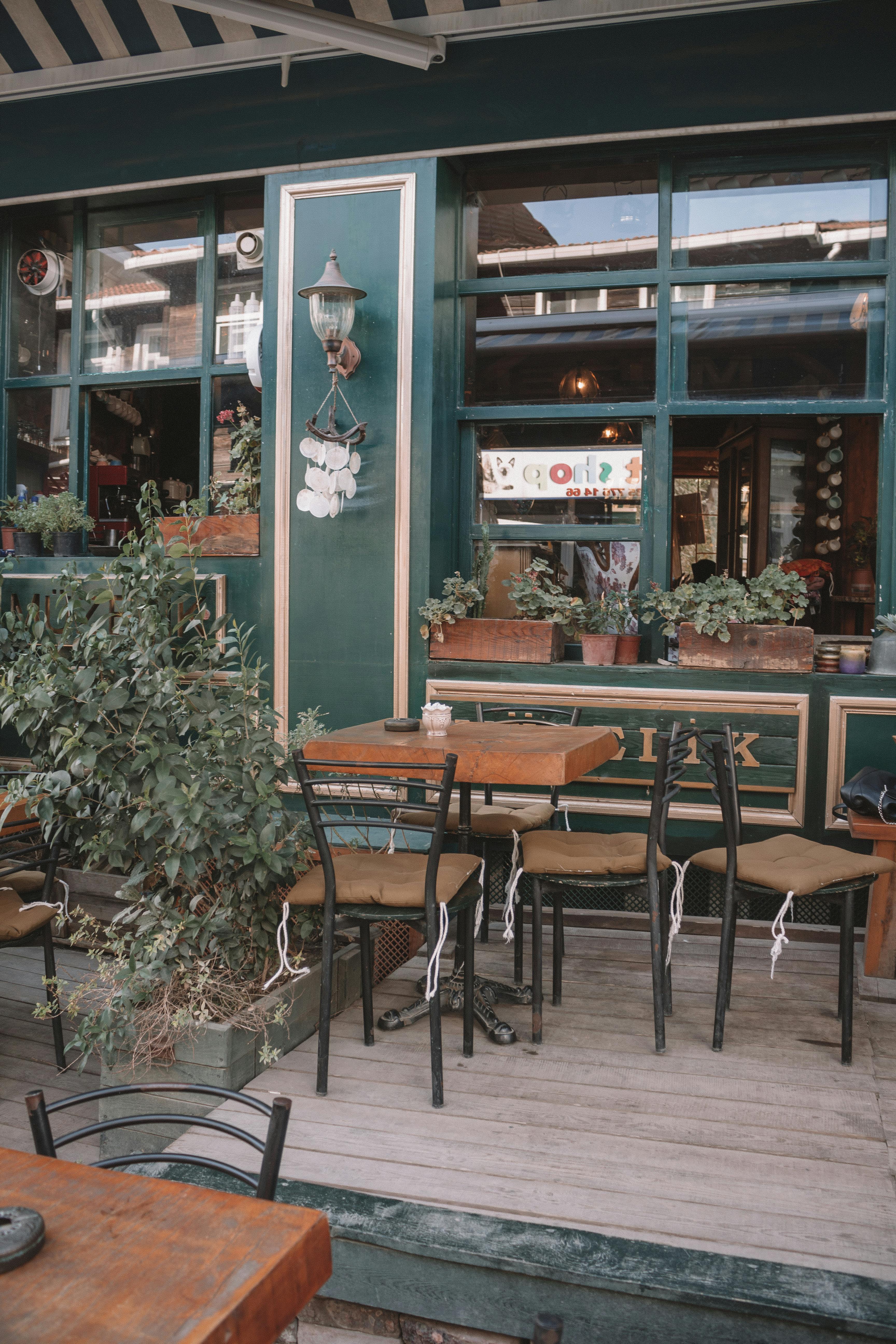 brown wooden table and chairs