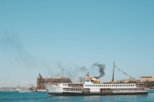 Free White Ship on Calm Sea Stock Photo