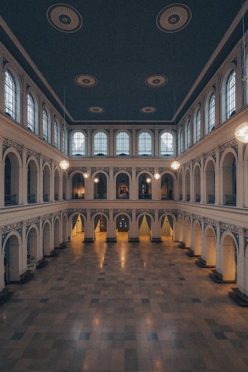 The inside of a building with a large room