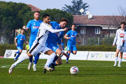 Dynamic action during a soccer match showing players competing fiercely. Perfect sports imagery.