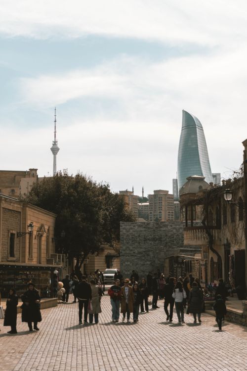 Free Capture of Baku's cityscape showcasing Flame Towers and bustling streets, blending old and modern architecture. Stock Photo