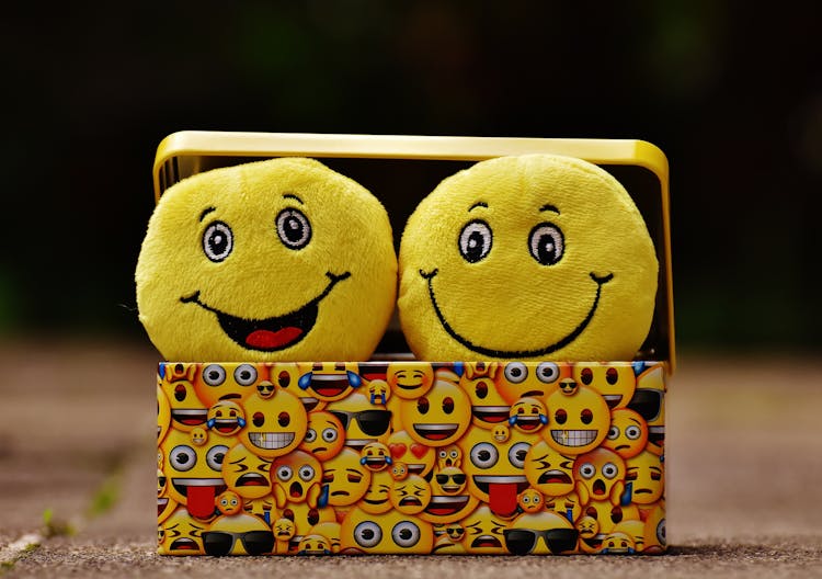 Two Yellow Emoji On Yellow Case