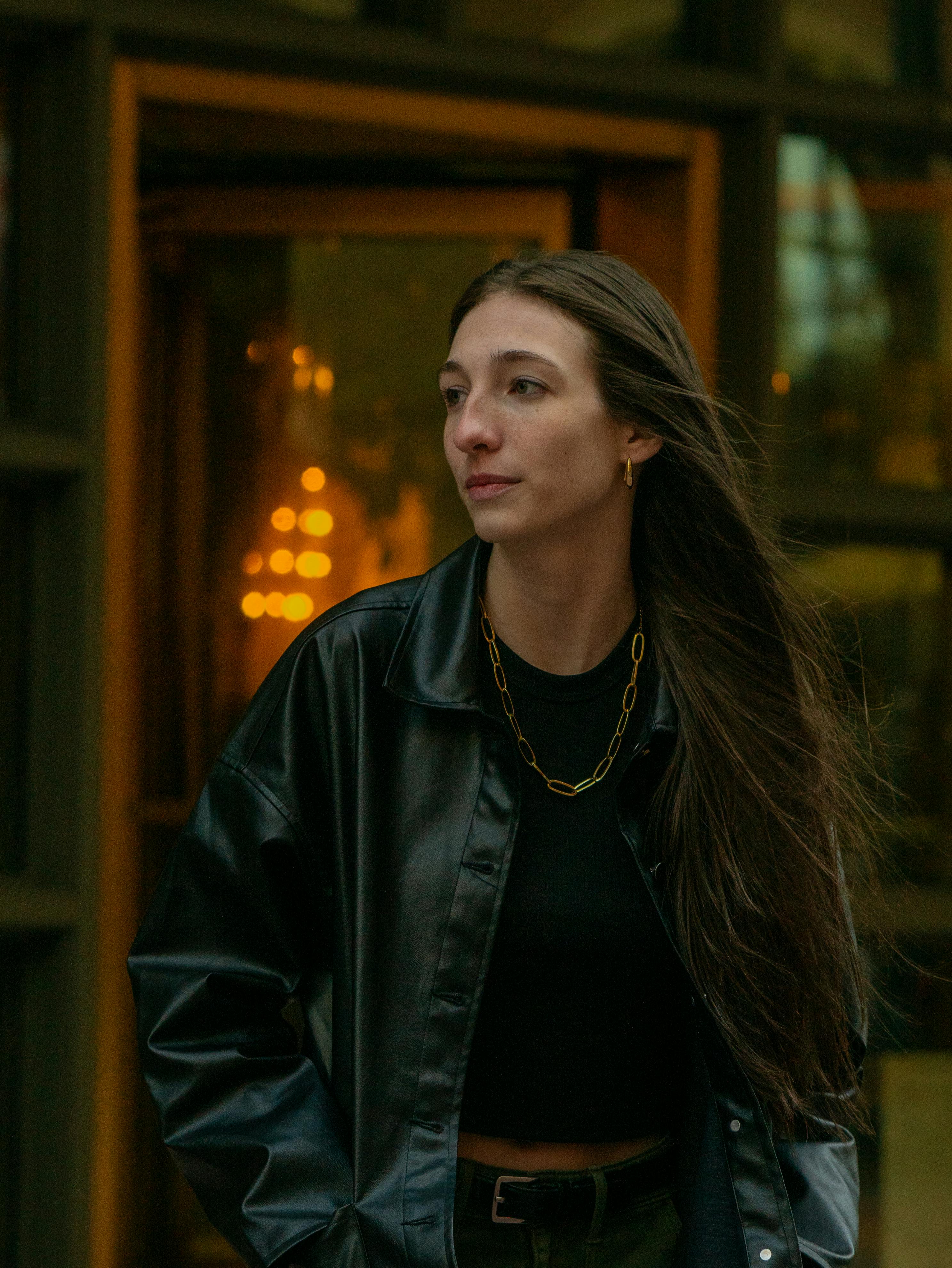 portrait of woman in black leather jacket