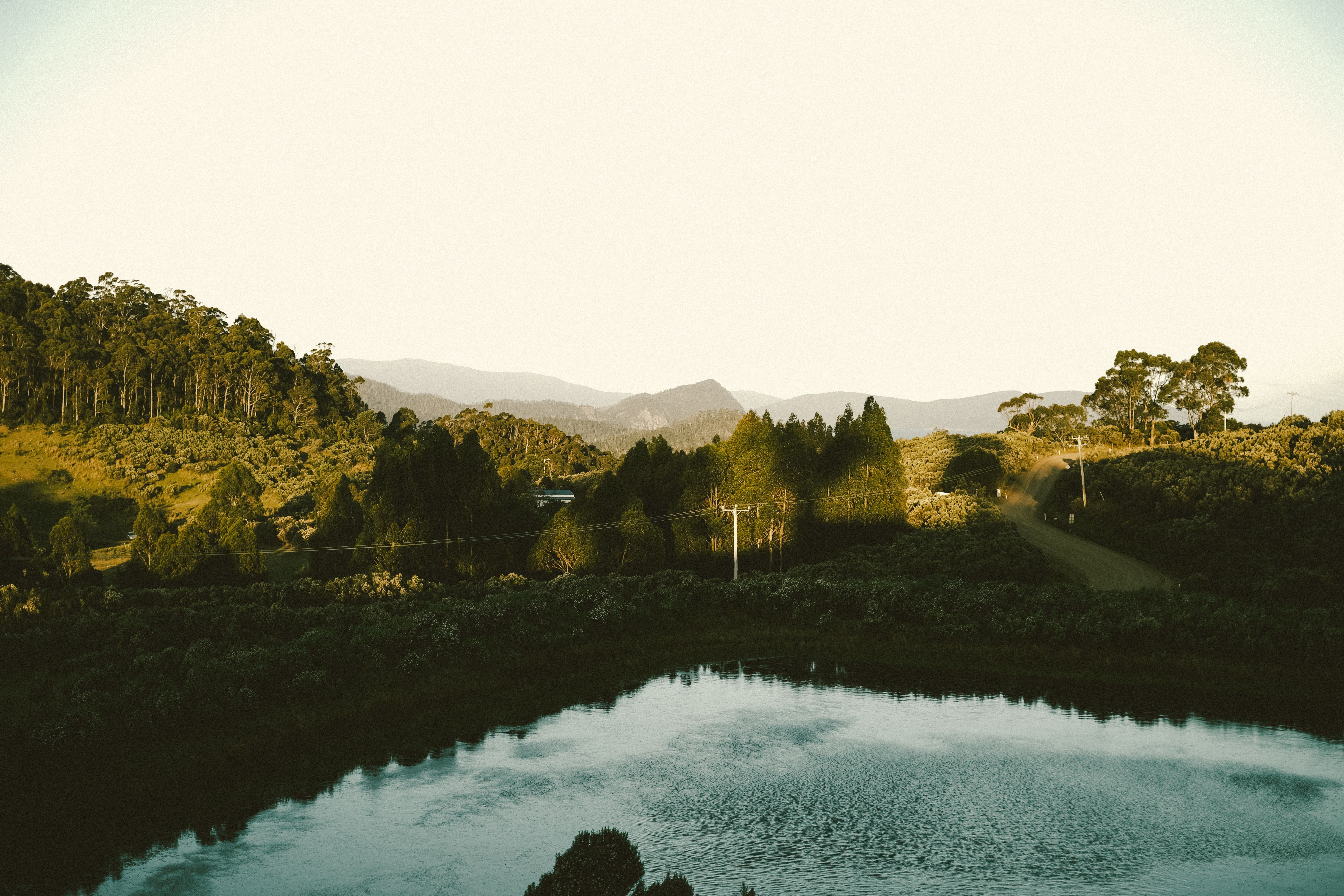 A view of a lake and mountains in the distance · Free Stock Photo