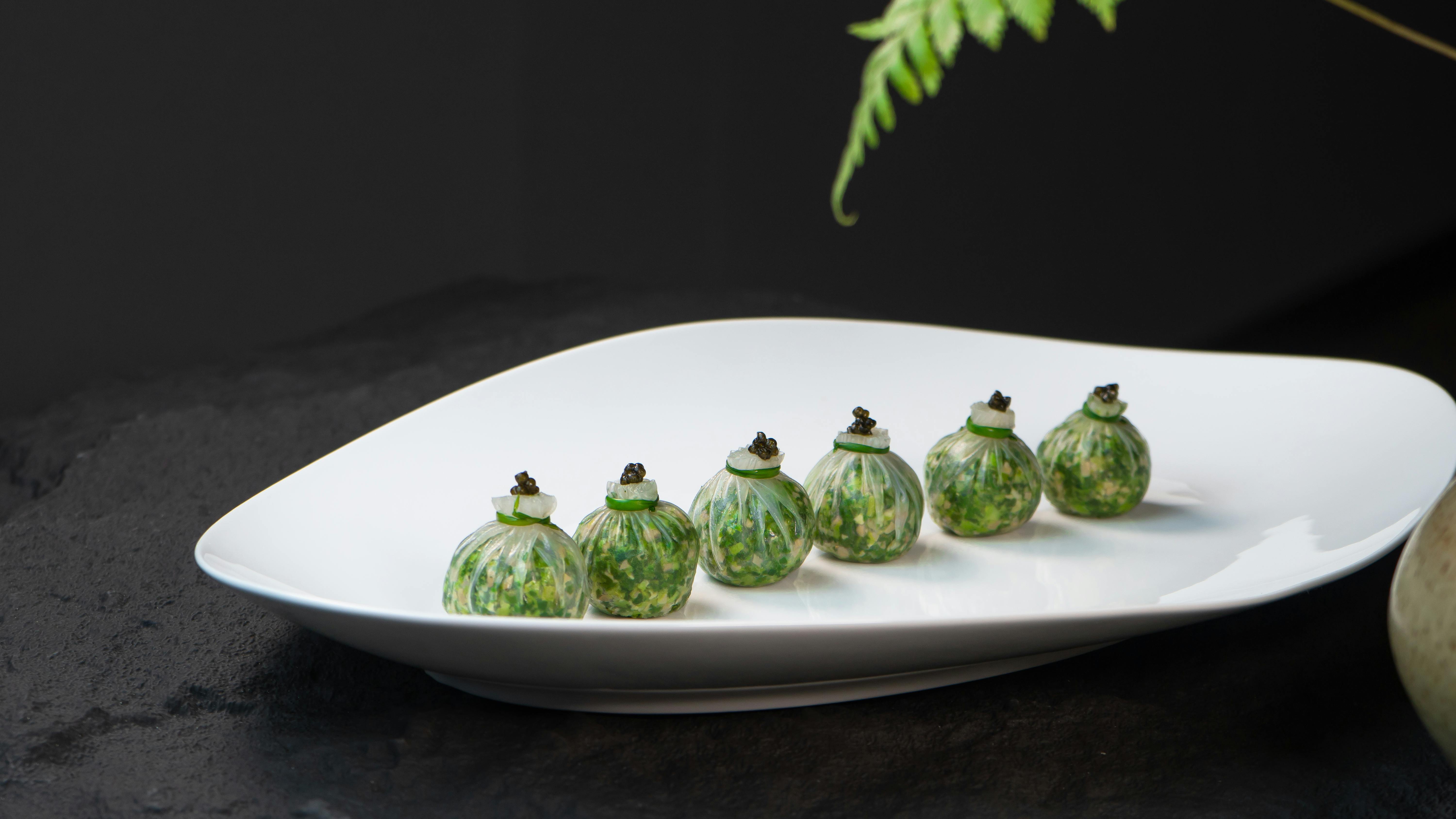 Best fine dining in Geneva — exquisite gourmet dish on a white plate