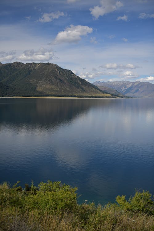 Foto profissional grátis de calma, lago, montanhas