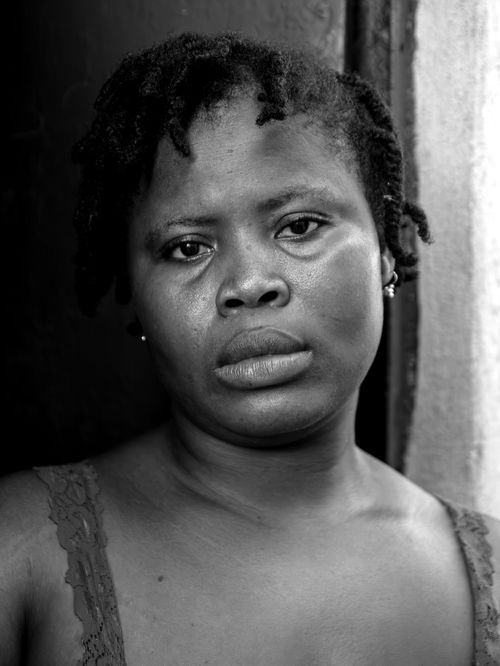 Free Close-up black and white portrait of a woman conveying deep emotions and expression. Stock Photo