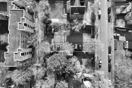 Black and white aerial view of Oxfordshire residential streets showcasing urban layout.