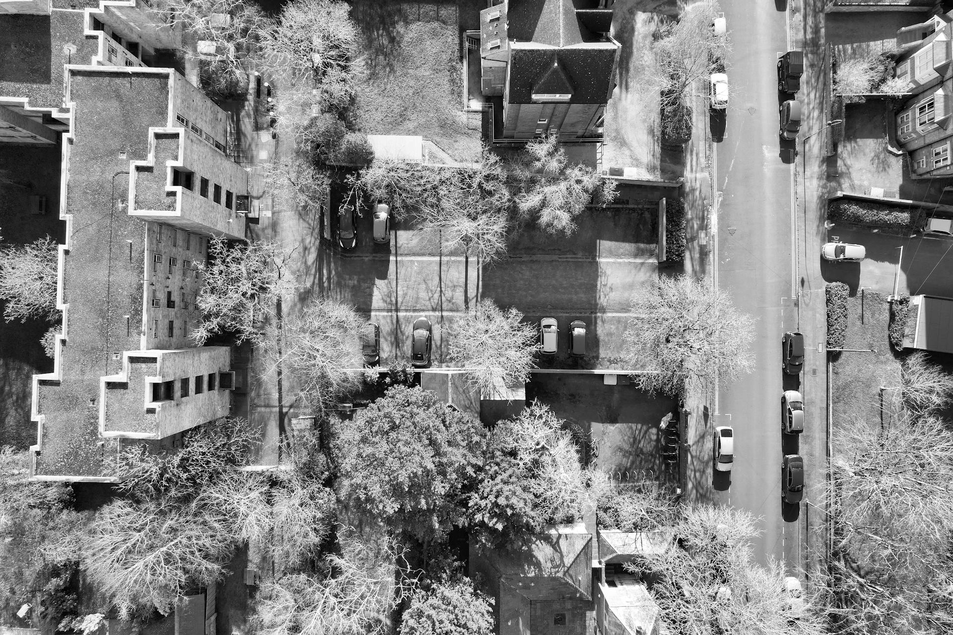 Black and white aerial view of Oxfordshire residential streets showcasing urban layout.