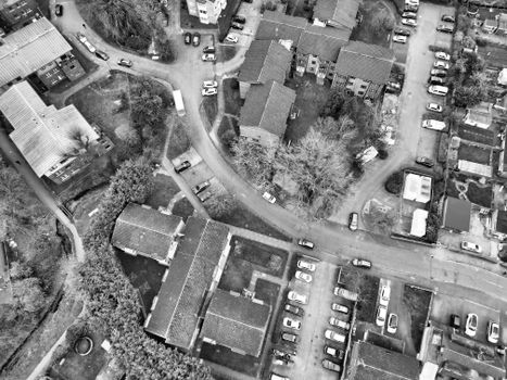 Black and white aerial photograph showcasing a residential neighborhood in Luton, UK.