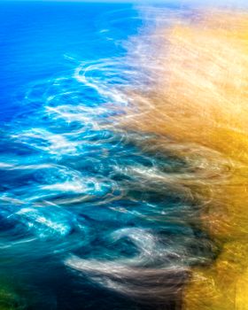 Dynamic abstract seascape with ethereal waves and vibrant colors.