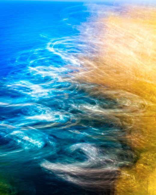 Dynamic abstract seascape with ethereal waves and vibrant colors.