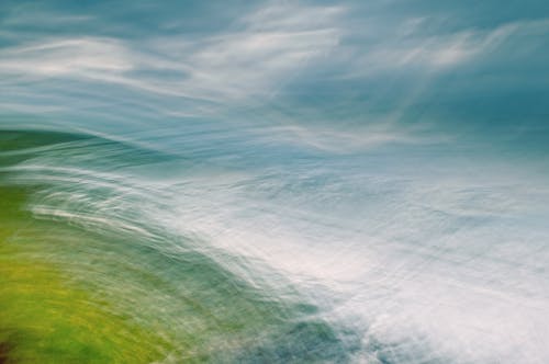 A blurry photograph of a green ocean