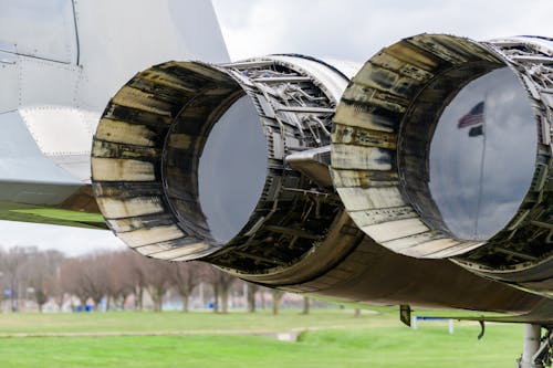 A close up of the exhaust pipes of a large jet