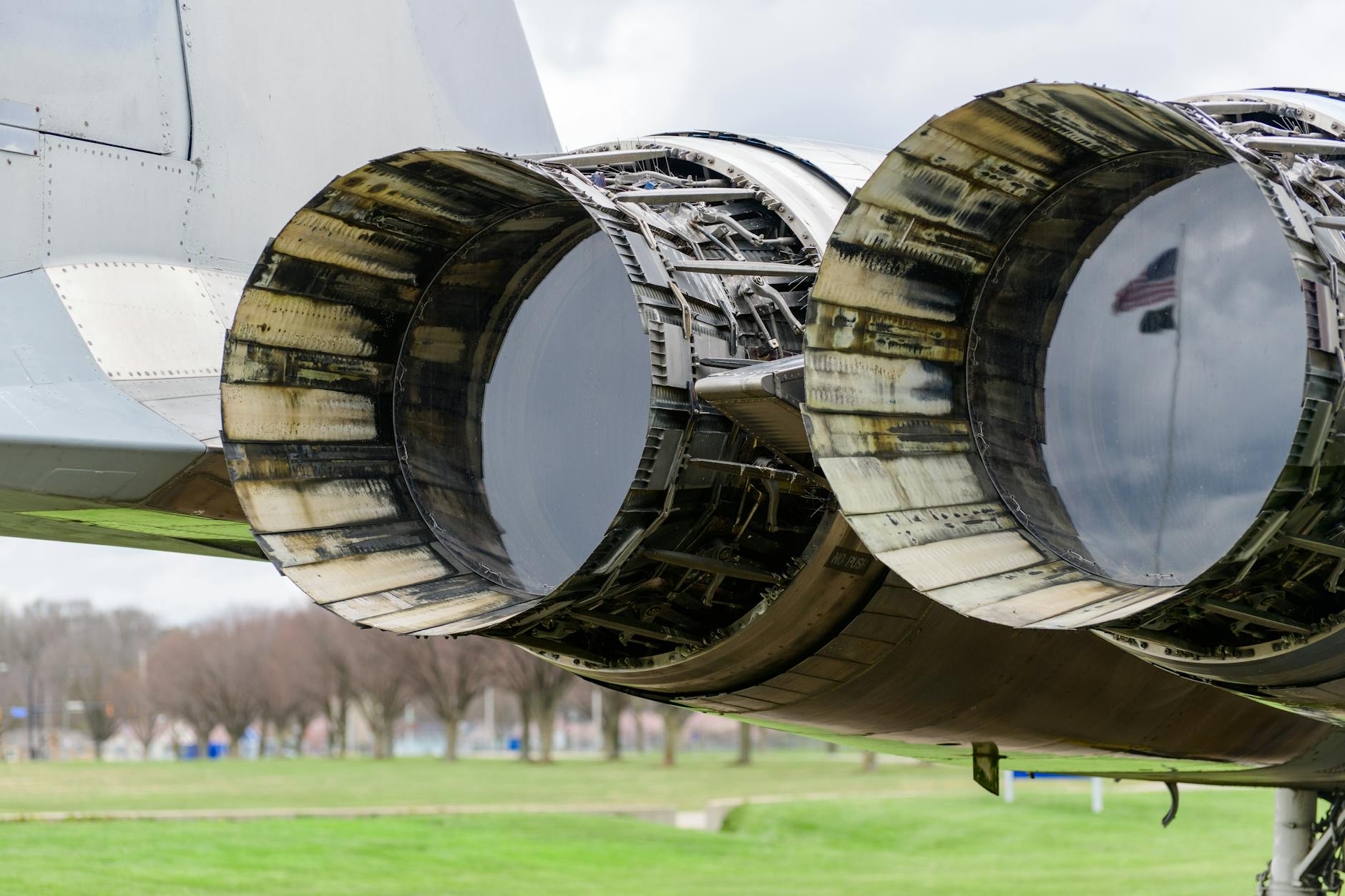 Detailed view of aircraft jet engines with reflections in Dayton, Ohio.