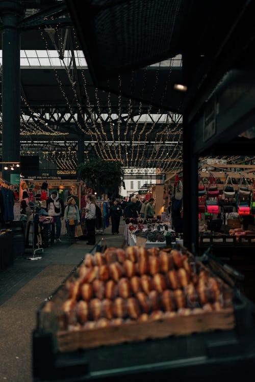 A market with a lot of donuts on display