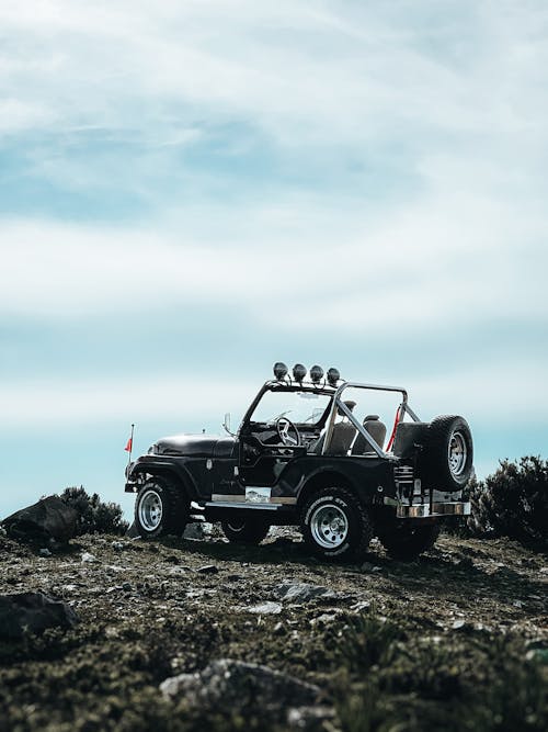 Jeep wrangler on top of a mountain