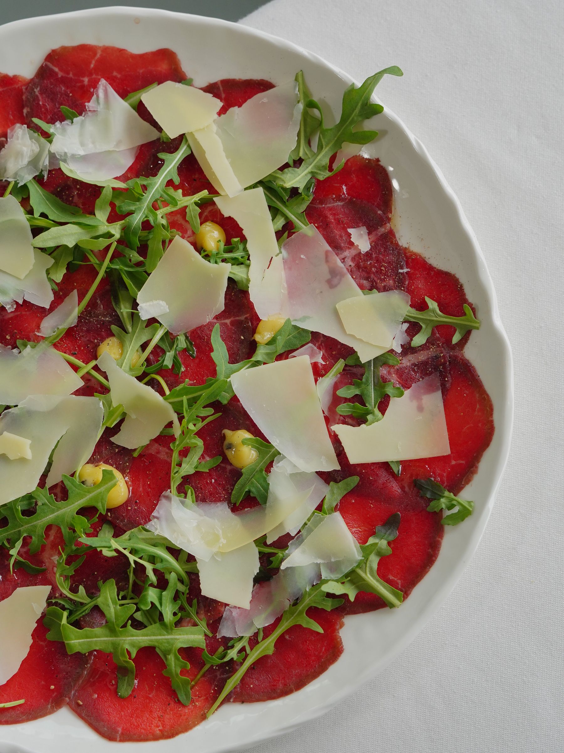 Beef carpaccio with arugula and parmesan