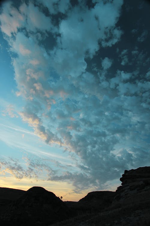 Beautiful cloud formation in the sky over mountains