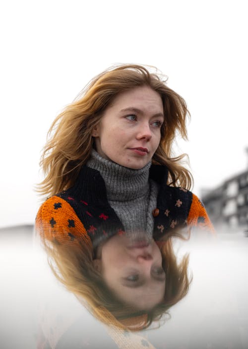 Portrait and Reflection of Woman in Sweater