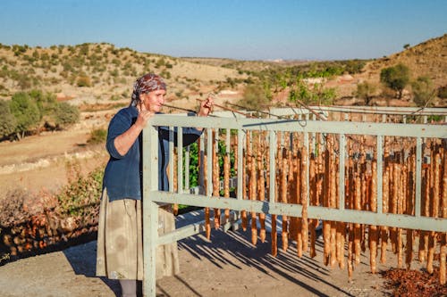 Woman making walnut sausage in an Assyrian village