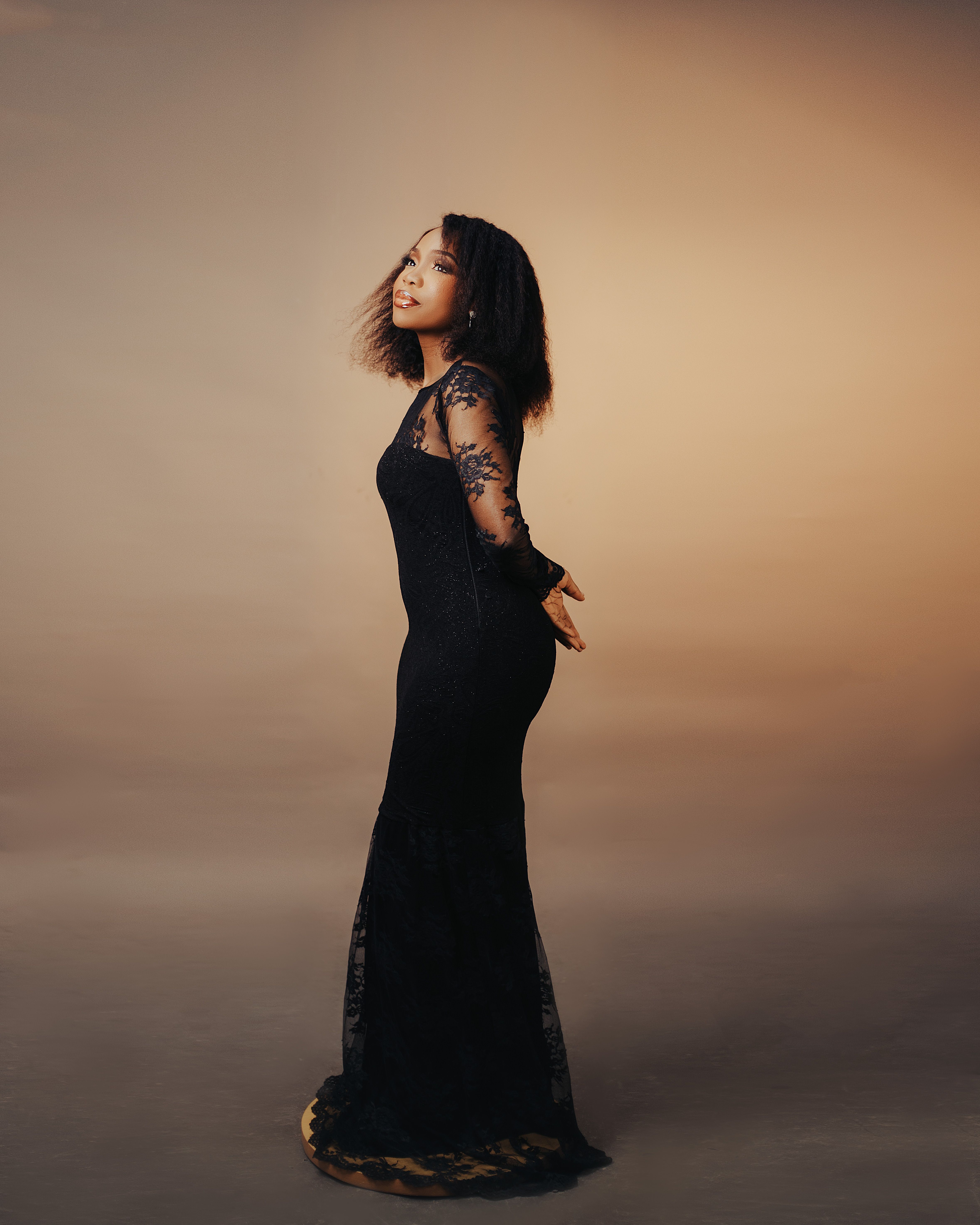 Elegant Woman in Black Dress Posing with Wineglass in Hand  Free Stock  Photo