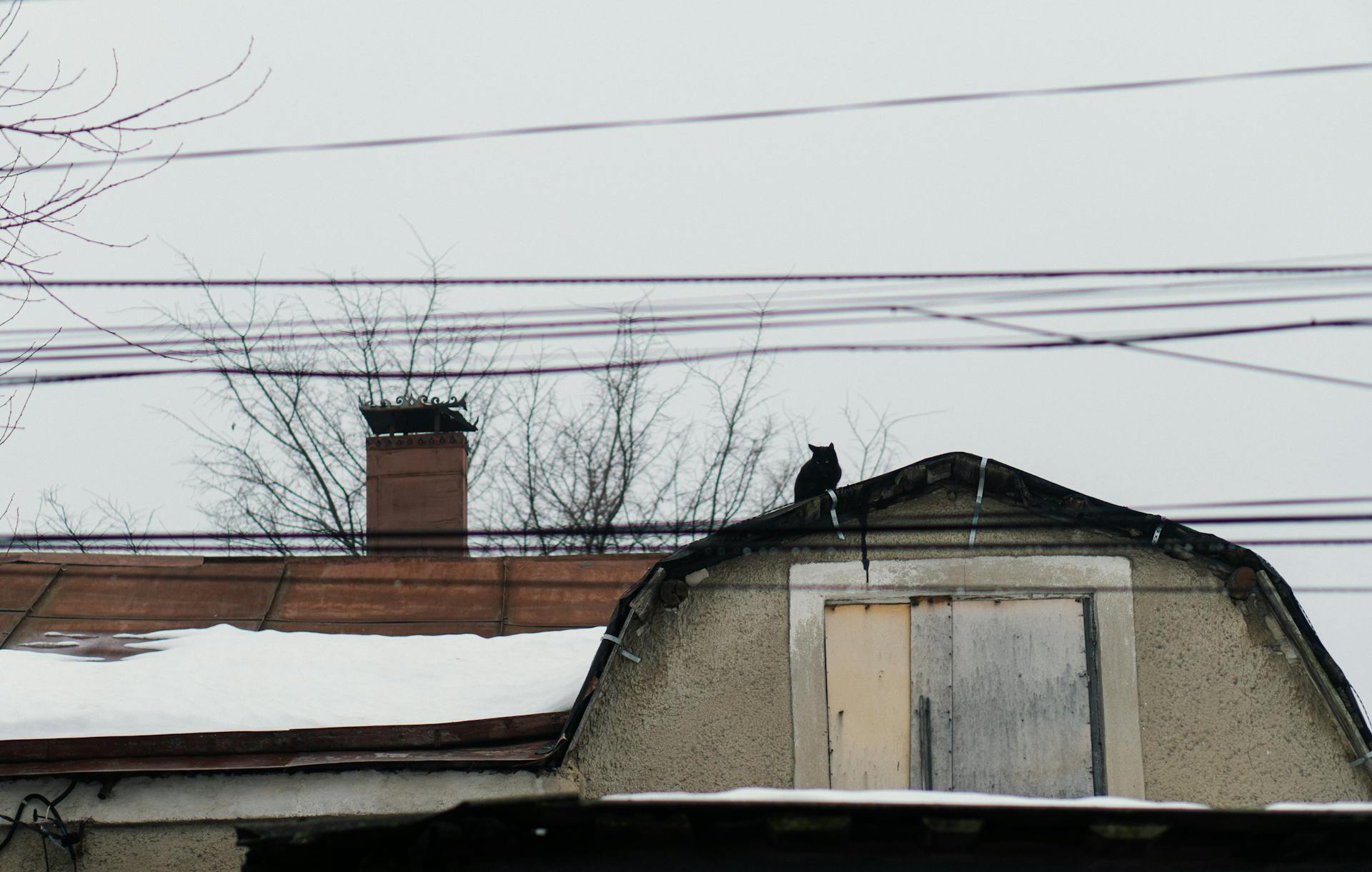 Roof of an Abandoned Building with Snow