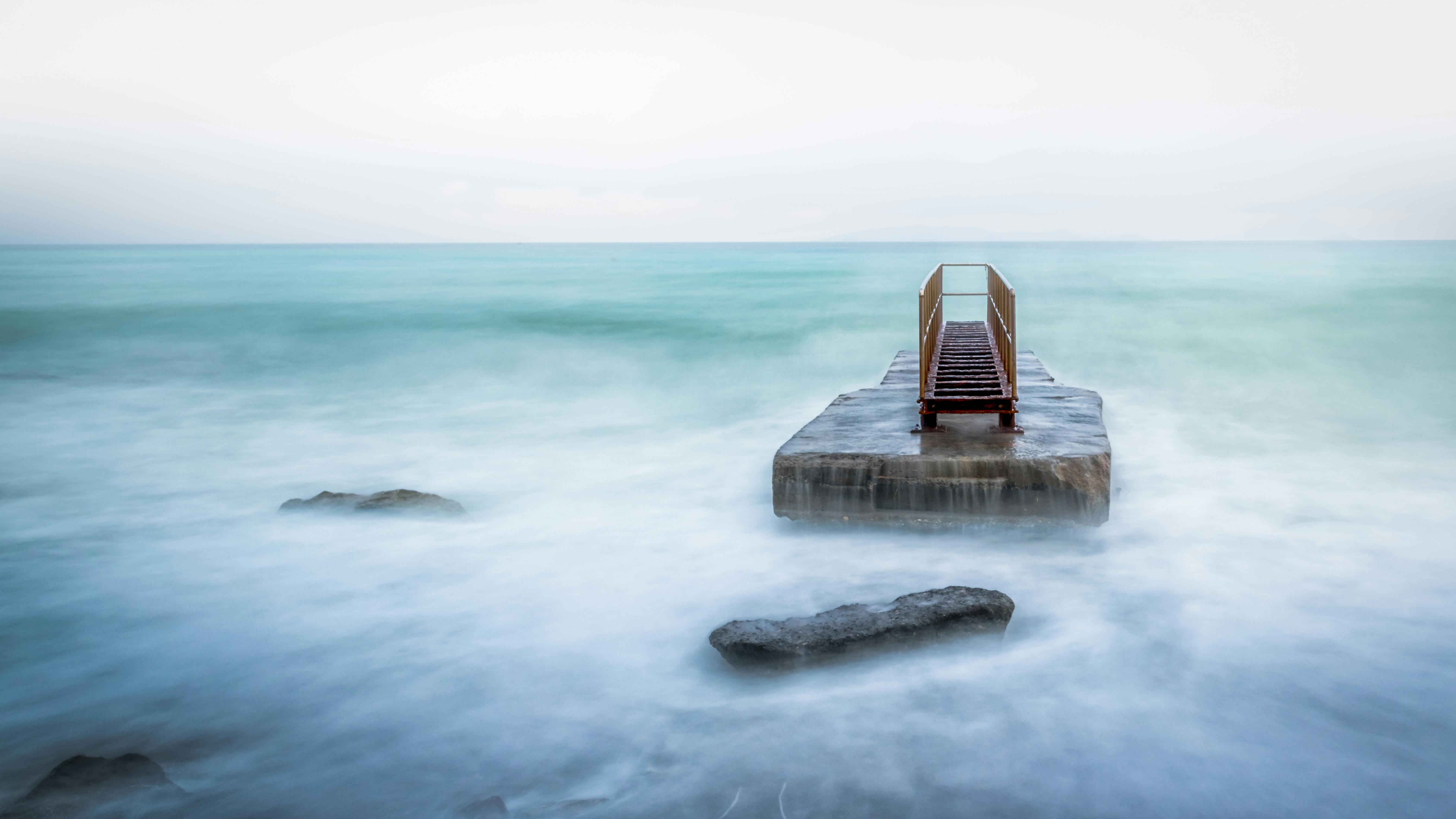 Brown Stone on Water · Free Stock Photo