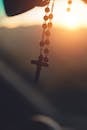 Silhouette Photography of Hanging Rosary