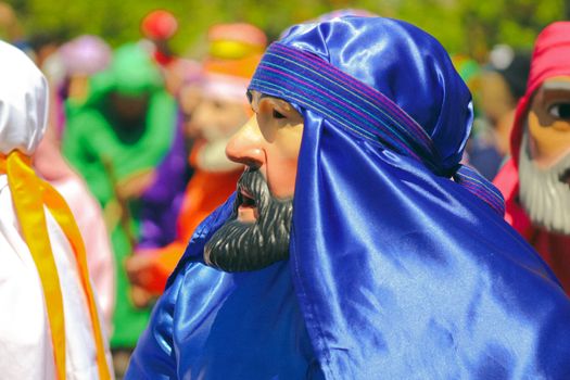 Vibrant costumes at a traditional Mexican festival parade in Purísima del Rincón.