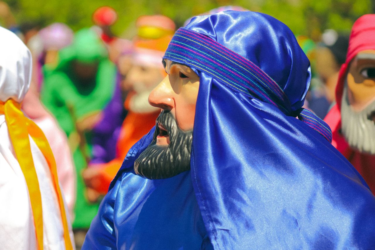 vibrant costumes at a traditional mexican festival parade in pur sima