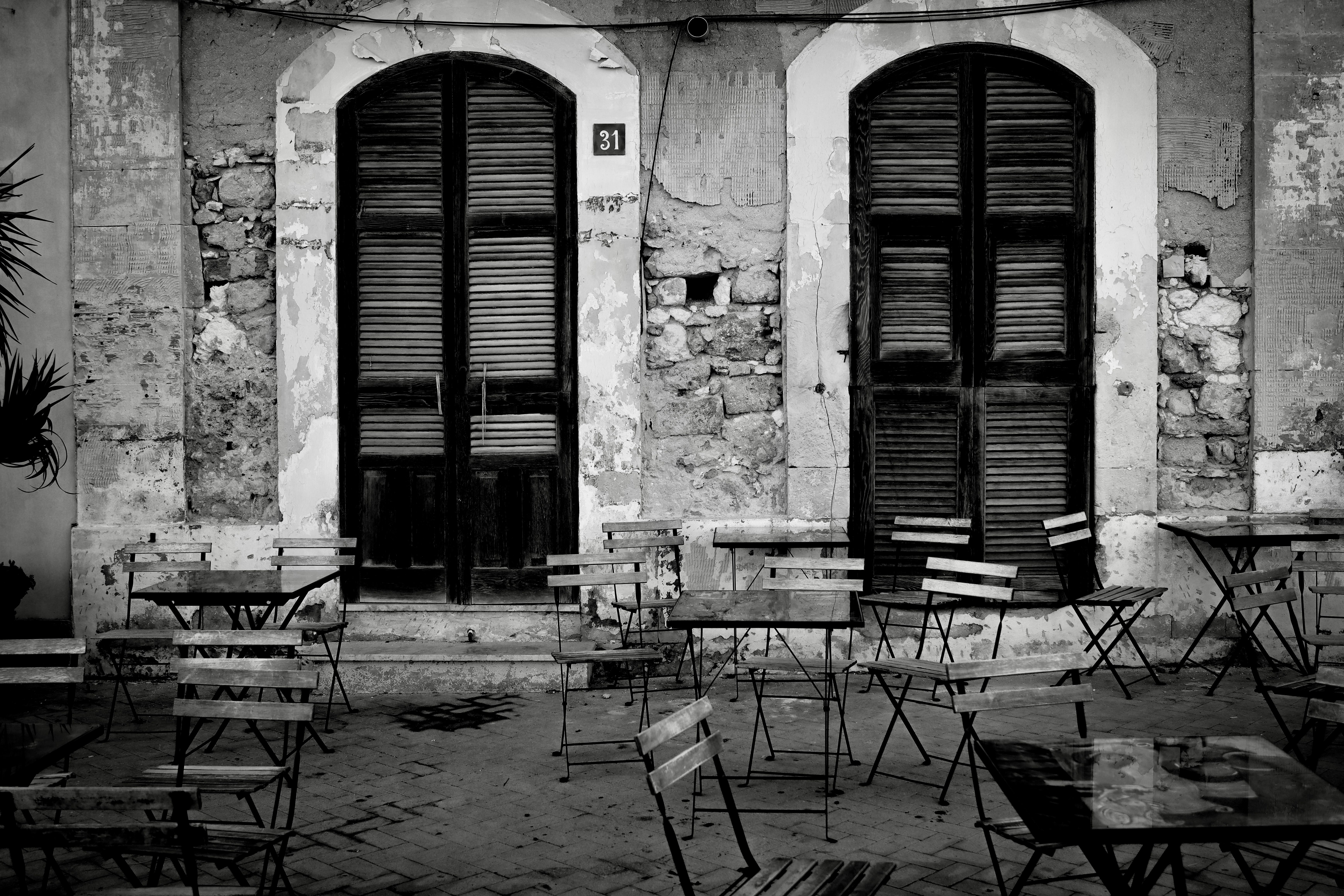 broken cafe chairs street