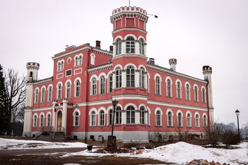 Free A stunning view of the historic Birini Palace with snow in Latvia, showcasing its architectural elegance. Stock Photo