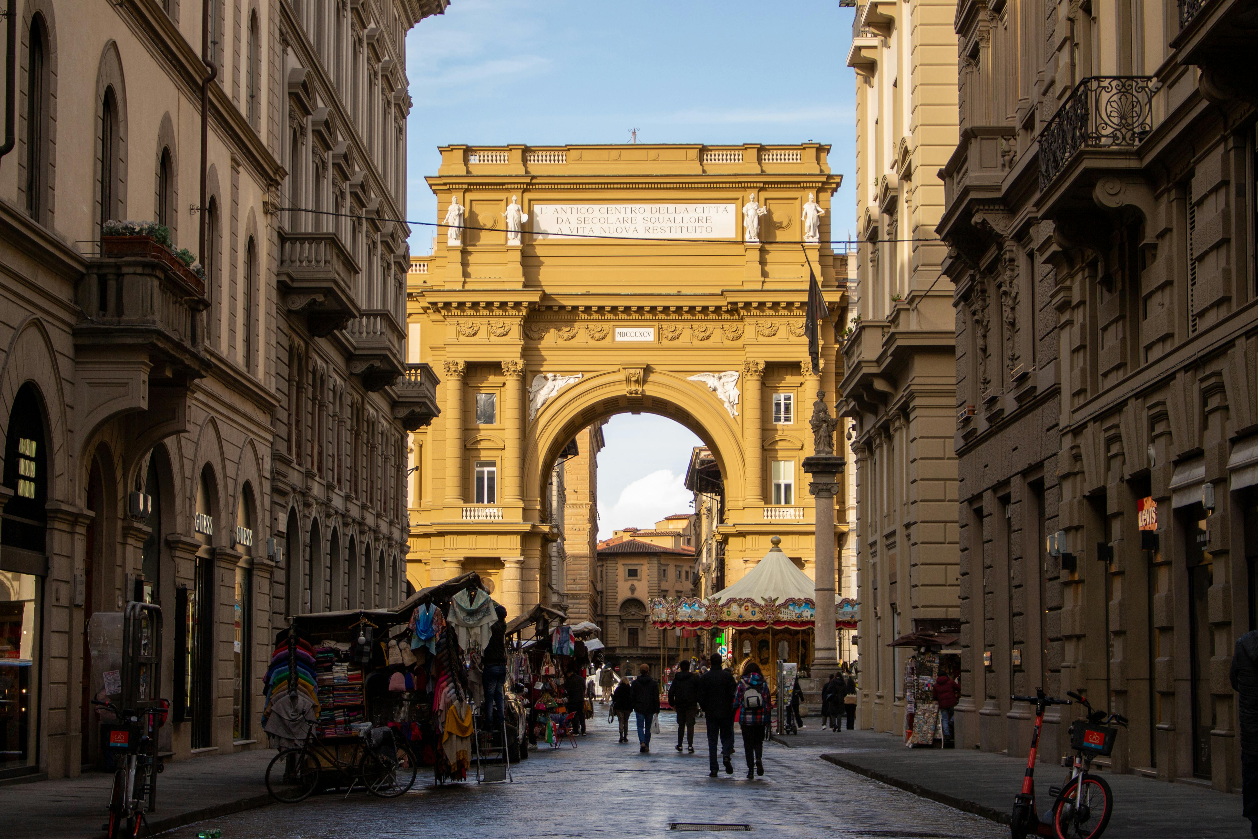 Explore Florence's Republic Square and its Renaissance architecture, vibrant streets, shops, and local life.