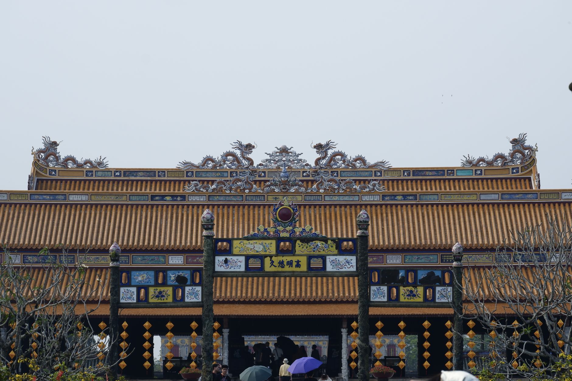 Majestic view of Thai Hoa Palace in Hue, Vietnam with intricate carvings.