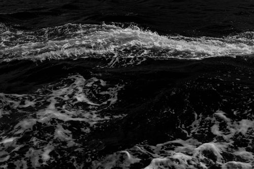 Free Monochrome image capturing the intense motion of ocean waves with a dramatic effect. Stock Photo