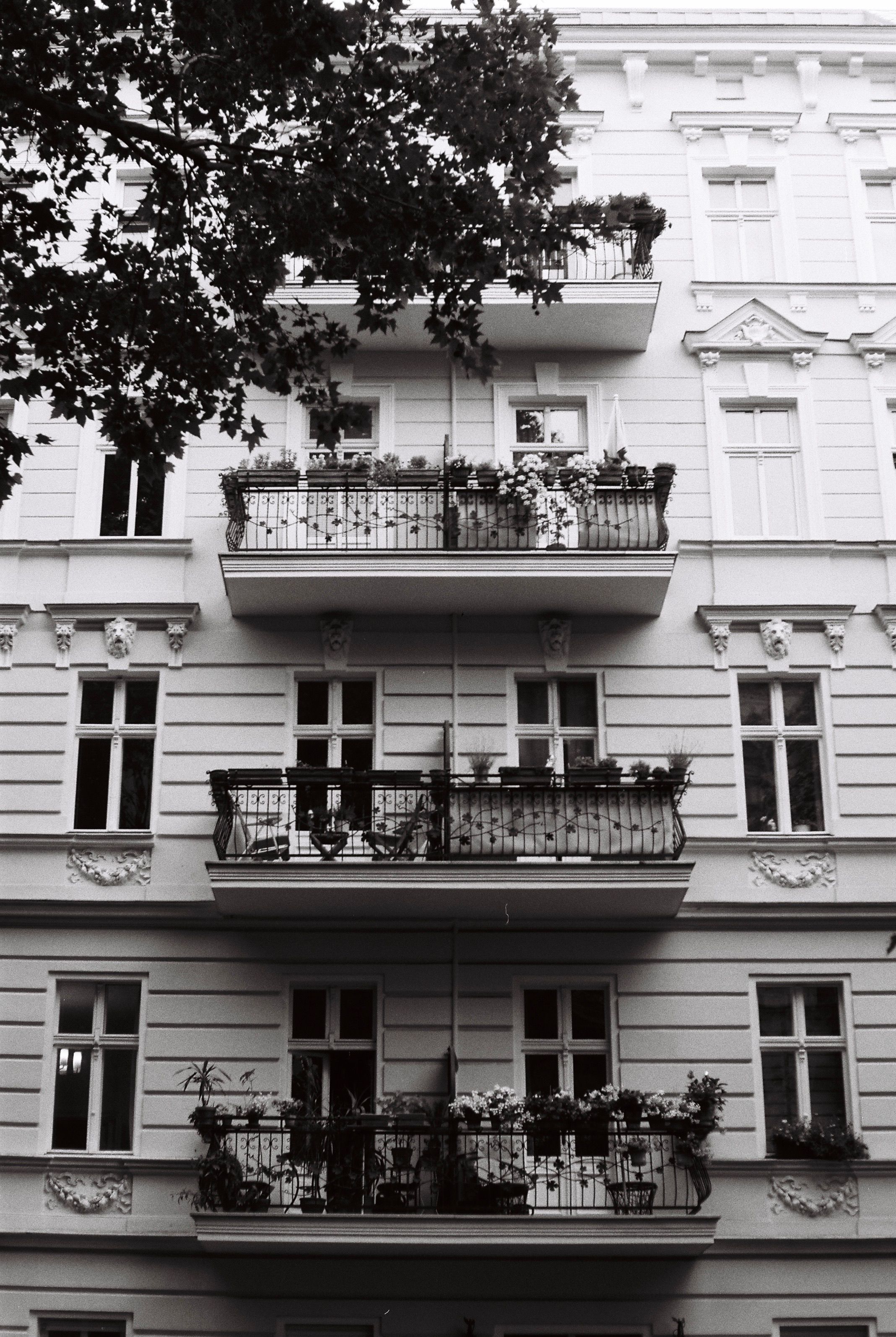 Balconies of Residential Building in Black and White · Free Stock Photo