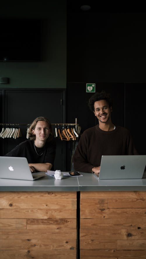 Men Working in a Clothes Shop 